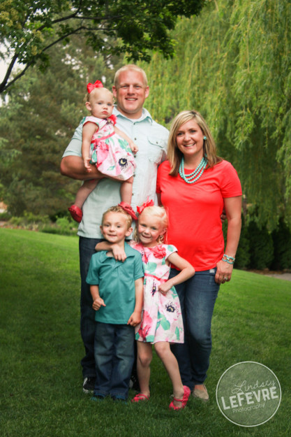 Lindsey LeFevre Photography. Family sitting on the grass at the ricks gardens. 