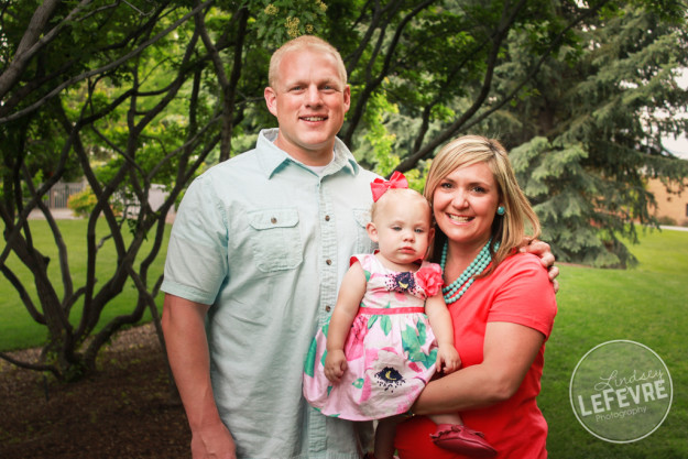 Lindsey LeFevre Photography. Family sitting on the grass at the ricks gardens. 