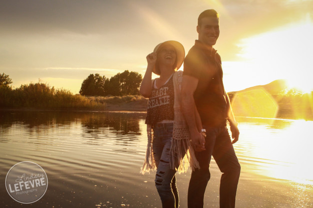 Lindsey LeFevre's shoot the fashion group photo. Couple flirting in Egin Lake at sunset. 