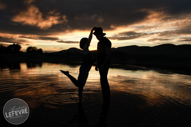 Lindsey LeFevre's shoot the fashion group photo. Couple dancing in Egin Lake at sunset. Silhouette.