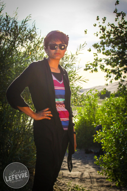 Lindsey LeFevre's women's fashion shoot. Girl wearing sunglasses at the sand dunes. 