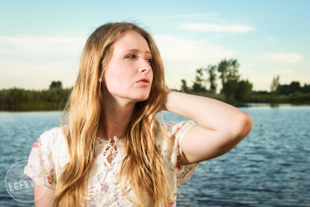 Lindsey LeFevre's women's fashion shoot. Girl with hand in hair at Egin Lake. 