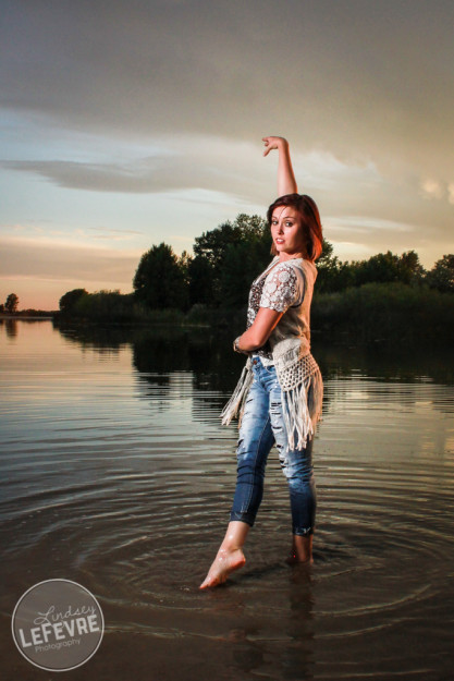 Lindsey LeFevre's women's fashion shoot. Girl dancing in Egin Lake at sunset. 