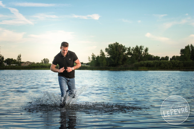 Lindsey LeFevre's men's fashion shoot. Guy splashing in Egin Lake. 