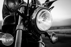 Lindsey LeFevre Personal Style Series: American Motorcycle. Matt Doggett on Motocycle in the sunset. Black and white photograph.